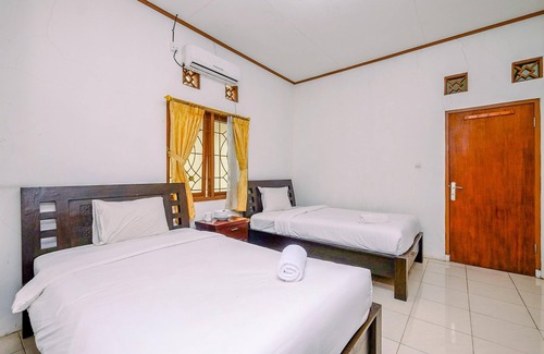Caringin Wohnung | Homey And Simply Studio At Graha Wishnu Guest House