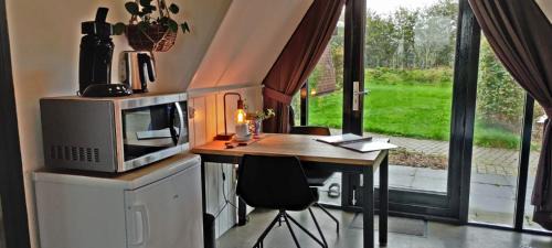 Warmenhuizen Haus | Hotelhuisje Warmenhuizen #A