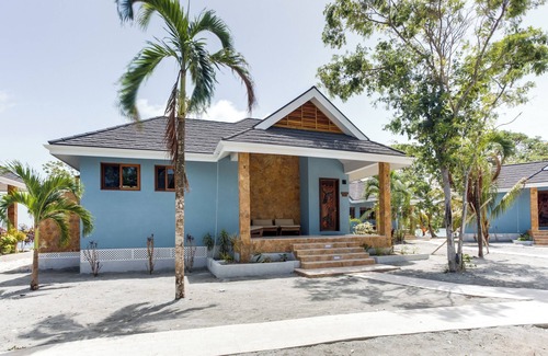 Placencia Haus | Hummingbird: Beachfront Cabana with Private Veranda on Belize Private Island