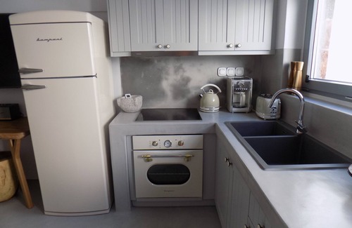 Pyrgos Haus | Imarkellis Pyrgos Traditional House and Belfry Charm with Courtyard in Santorini