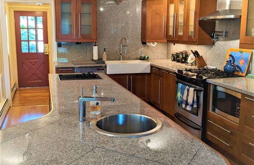 Eastport Haus | Indoor/Outdoor waterfront oasis with indoor heated pool awaits you in Eastport!