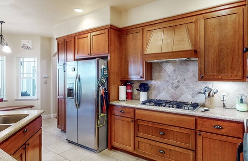 Rough and Ready Haus | Inviting home with balcony, fireplace, full kitchen, & washer/dryer