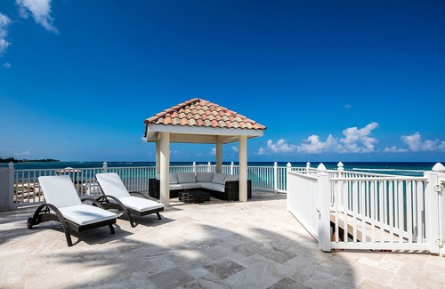 Old Man Bay Haus | KiToCay: Modern Beach House w/Over-the-Water Sun Deck & Private Beach Lot
