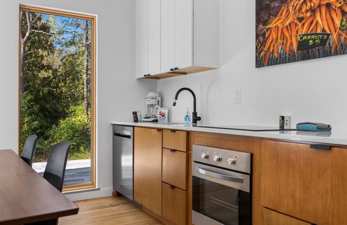 Acme Kabine | KOTI 12 (Three Bedroom) Traverse City's Scandinavian Cabins, vacation home on TART & mins to Travers