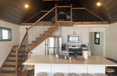 National City Hütte | Lake/beach front property with kayaks, pedal boat, & row boat, near Tawas Bay