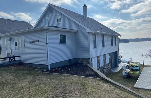 Mecosta Haus | Lake Front House on Tri-Lakes, championship golf, kayaks, paddle boards, pontoon