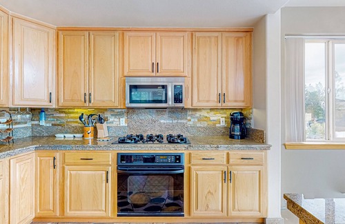 Tahoe Keys Haus | Lake Tahoe Hideaway with rooftop hot tub, fireplace, scenic balcony, & smart TVs