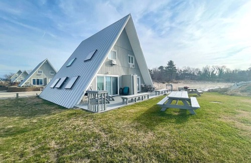 Stevensville Haus | Lakefront Chalet #2 with Beach Access, Pools, Sport Courts, Fishing Pond & more!