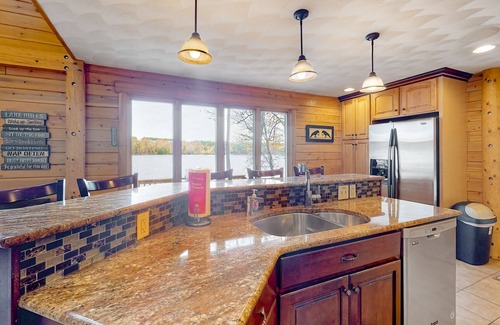 Norway Haus | Lakefront, dog-friendly home with dock, kayaks, SUPs, canoe, huge deck & firepit