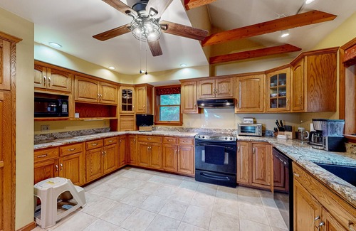 Raymond Haus | Lakefront home with amazing sunrise & sunset views, game tables & water toys