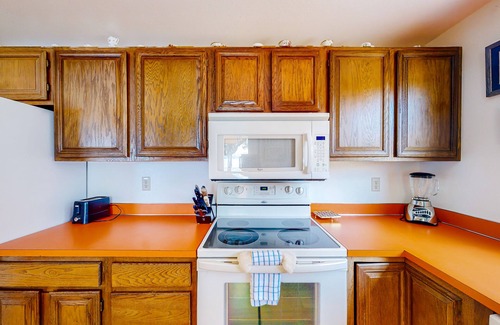 Big Arm Haus | Lakefront home with private beach, dock, firepit, & grill - dazzling sunset view