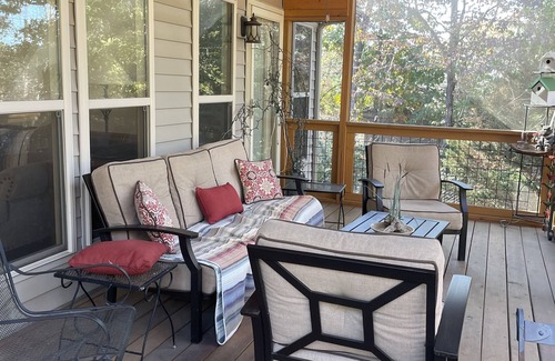 Winchester Haus | Lakefront home with dock. Cozy 2 bed 2 bath and screened in porch.