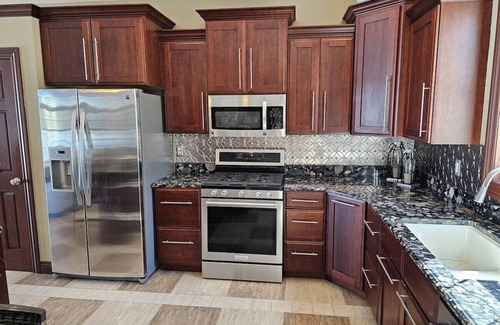 Wetmore Haus | Lakehouse near Pictured Rocks, Trails, Personal Bar, Game Room, & Hot Tub!