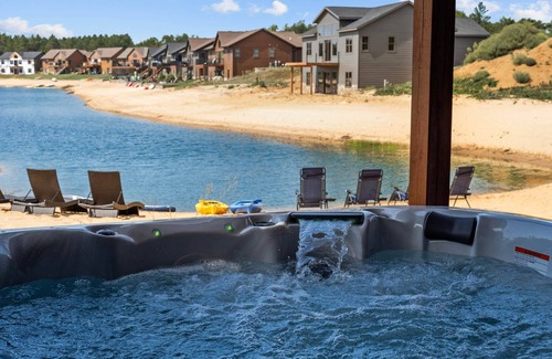 New Lisbon Haus | Lakehouse on Beach Lake, Wi Hot Tub and Screened in Porch near Castle Rock Lake