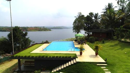 Vazhavatta Haus | LakeRose Wayanad Resort - Lake view