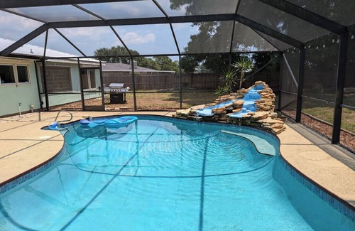 Interchange Square Haus | Large 4bd 2bth pool home with waterfall feature and private back yard!