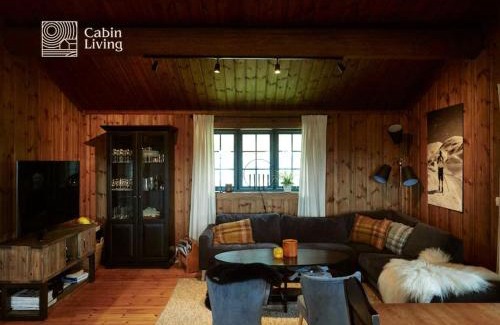 Nes Haus | Large cabin at Nesfjellet with lovely view, inddor Jacuzzi & sauna