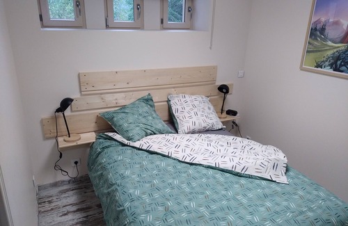 Saint-Lupicin Wohnung | Le Lupicin, a quiet, comfortable one-bedroom apartment
