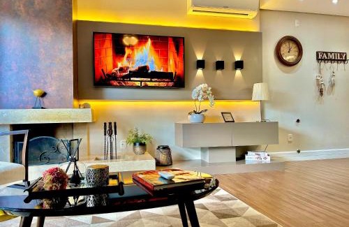 Carniel Wohnung | Lindo e aconchegante com lareira cond c/piscina