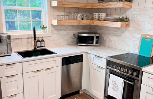 Newnan Haus | Little Cottage with Pavilion and Fire Pit