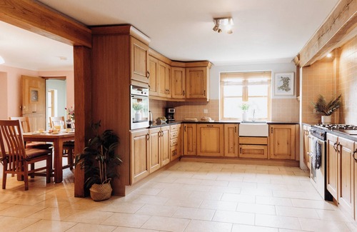 Devils Bridge Haus | Lovely countryside farm house with large hot tub and disabled friendly. Sleeping 12