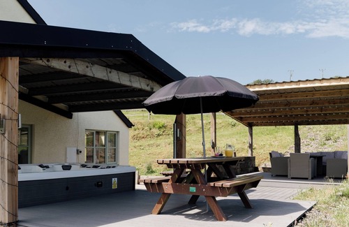 Devils Bridge Haus | Lovely countryside farm house with large hot tub and disabled friendly. Sleeping 12