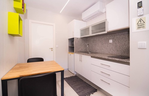 Santana Haus | Lower-level Studio w/ kitchenett and patio