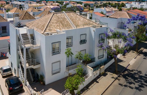 Vila Nova De Cacela Wohnung | Luminous 3BDR Apartment W/Balcony by LovelyStay