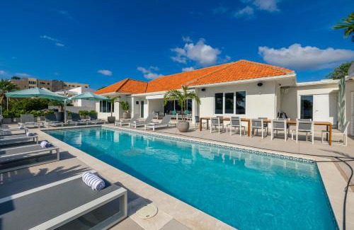 Oranjestad Villa | LUX 10BR 10BA Pool Beach Front Villa Playa by Bocobay
