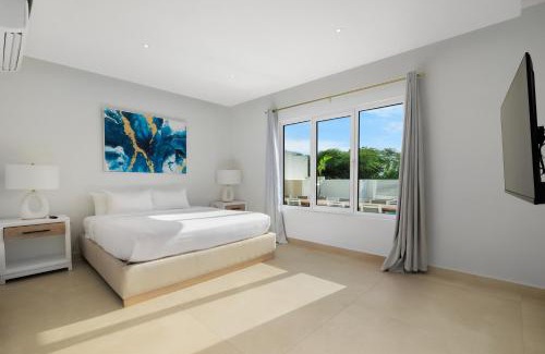 Oranjestad Villa | LUX 10BR 10BA Pool Beach Front Villa Playa by Bocobay