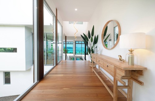 Airlie Beach Haus | Luxurious 5-bed home with pool, nestled in a private estate with ocean views