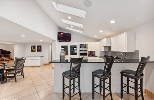 La Porte Haus | Luxurious Lakefront Estate with Pool, King Beds, Hot Tub MTM Premier Property Management