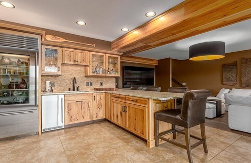 Chippewa Falls Haus | Luxury House on Lake Wissota w/Private Beach, Docks, Hot Tub, Fire Pit and More