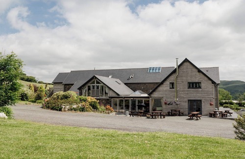 Devils Bridge Haus | Luxury renovated barn in the countryside with a large hot tub sleeping up to 38. Pets welcome