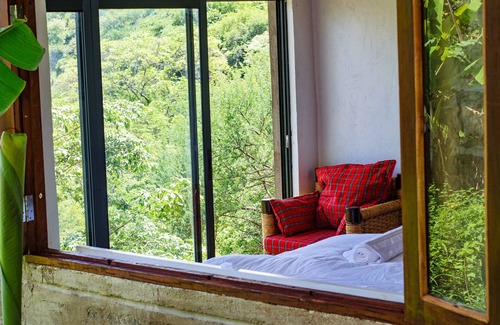 Taita Hills Hütte | Luxury River Side cottage with magnificent views of sagalla and chawia hills.