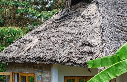 Taita Hills Hütte | Luxury River Side cottage with magnificent views of sagalla and chawia hills.