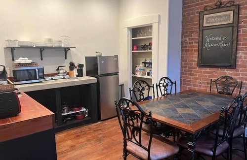 Madison Haus | "Madison Manor I" by The River: Nice patio, hot tub, gas grill, and fire pit