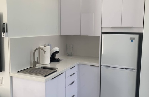 South Middle River Haus | Men Only Clothing Optional Guesthouse near Wilton Manors