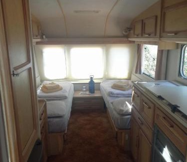 Lagos Haus | Michas caravan for 2 See the herd of horses from your bed