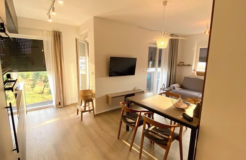 Fazana Wohnung | Moderne Ferienwohnung in perfekter Lage. Meer und Altstadt fußläufig erreichbar