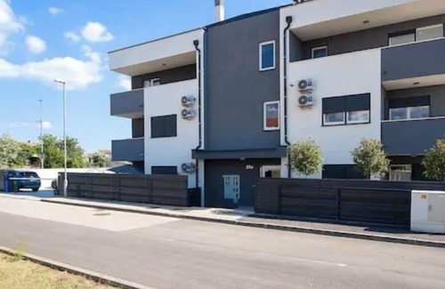 Fazana Wohnung | Moderne Ferienwohnung in perfekter Lage. Meer und Altstadt fußläufig erreichbar