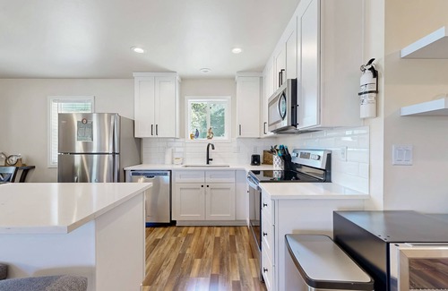 Rockaway Beach Haus | Modern Beach Cottage with a covered patio, fire pit, grill, & easy beach access