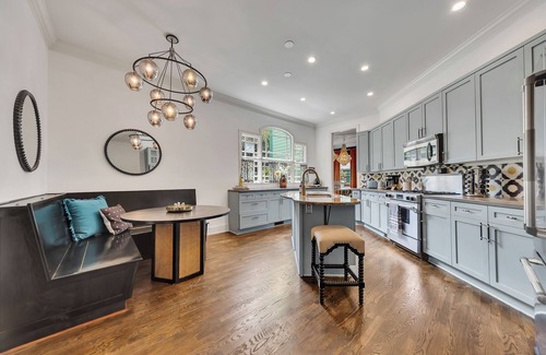 Inman Park Haus | Modern-boho meets classic Victorian in this 5BR, 4BA Inman Park gem. Includes a separate in-law suite with full kitchen and laundry. Walk to BeltLine, MARTA, dining, and more!