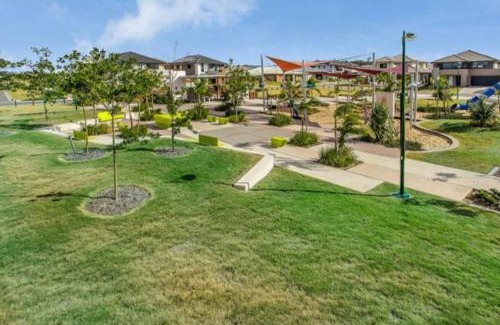 Mango Hill Haus | Modern Elegance Near Lakes Train Parks and Beaches