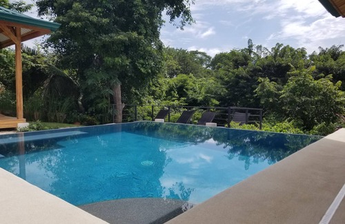 Nosara Haus | Modern Hill top Home with a Beautiful Tropical View