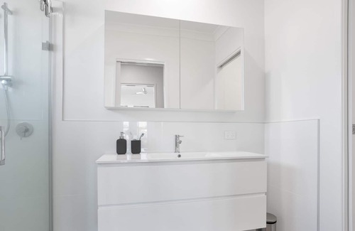 Trinity Beach Haus | Modern Home with Private Spa and Fenced Garden