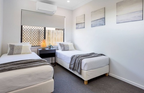 Trinity Beach Haus | Modern Home with Private Spa and Fenced Garden