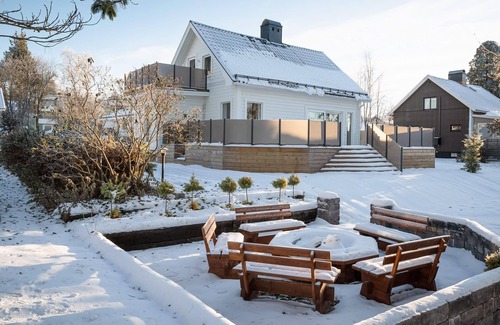 Lovholmen Villa | Modern Piteå Villa: Calm & Convenient