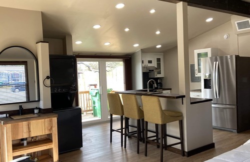 Cocoa Haus | Modern Ranch Studio With a Beautiful Round Porch