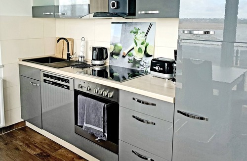 Ziemitz Eigentumswohnung | Moderne Ferienwohnung mit Balkon direkt an der Peene